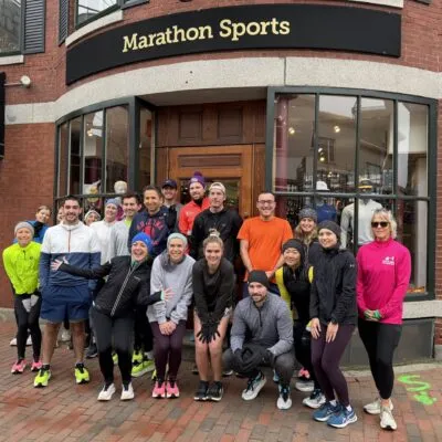 Marathon Sports Portsmouth Run Group in front of the store