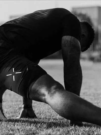 Ten Thousand Shorts Man Stretching