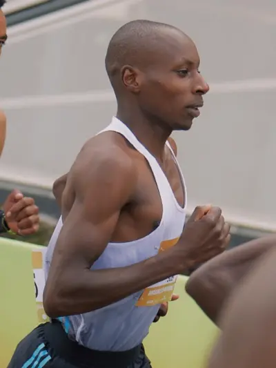 Men running against each other in a 5k