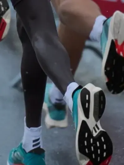 Group running in adidas running shoes