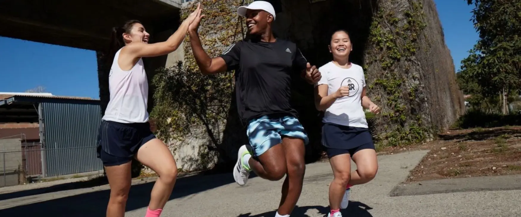 group of friends running together
