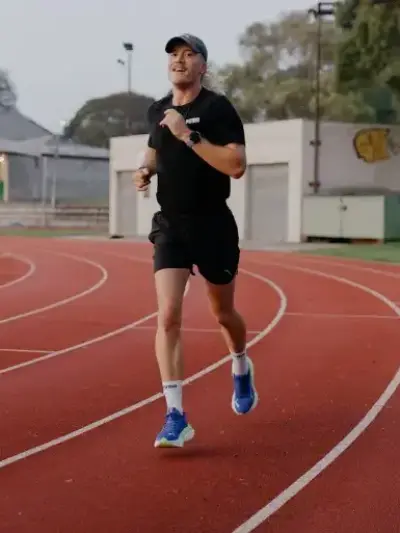 Man running in a pair of PUMA Mag Max Running shoes