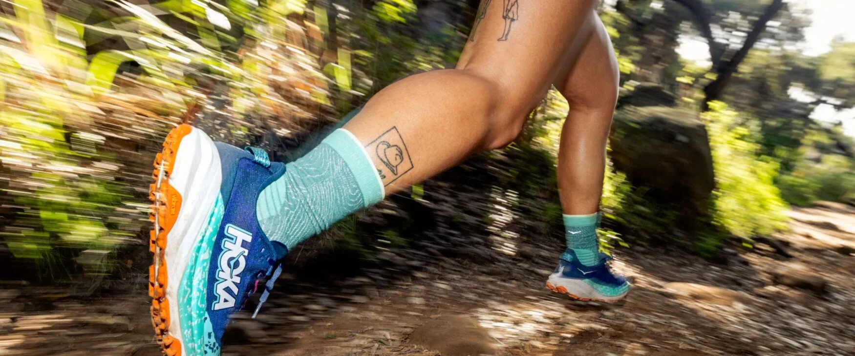 HOKA Speedgoat 6 lifestyle runner on trail womens