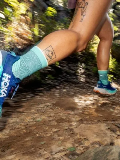 HOKA Speedgoat 6 lifestyle runner on trail womens