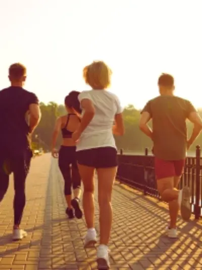 Group of people running together