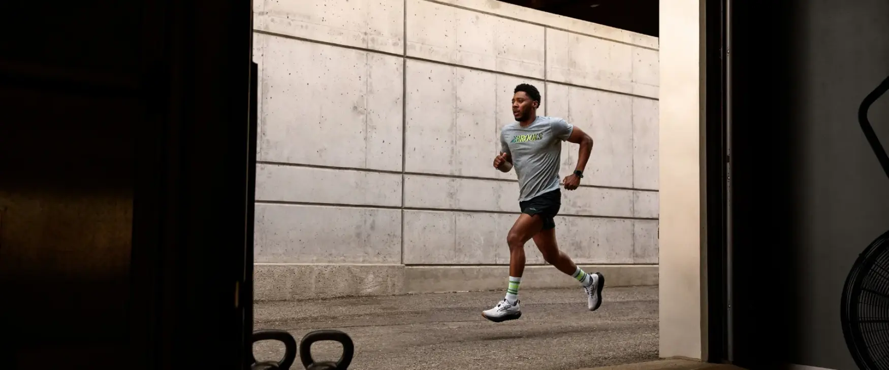 Man running in Denver wearing Brooks Glycerin 21 running shoes