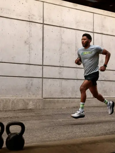 Man running in Denver wearing Brooks Glycerin 21 running shoes