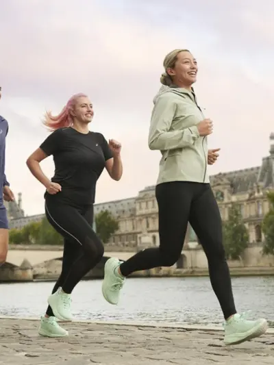 Group of men and woman running together in cooler weather