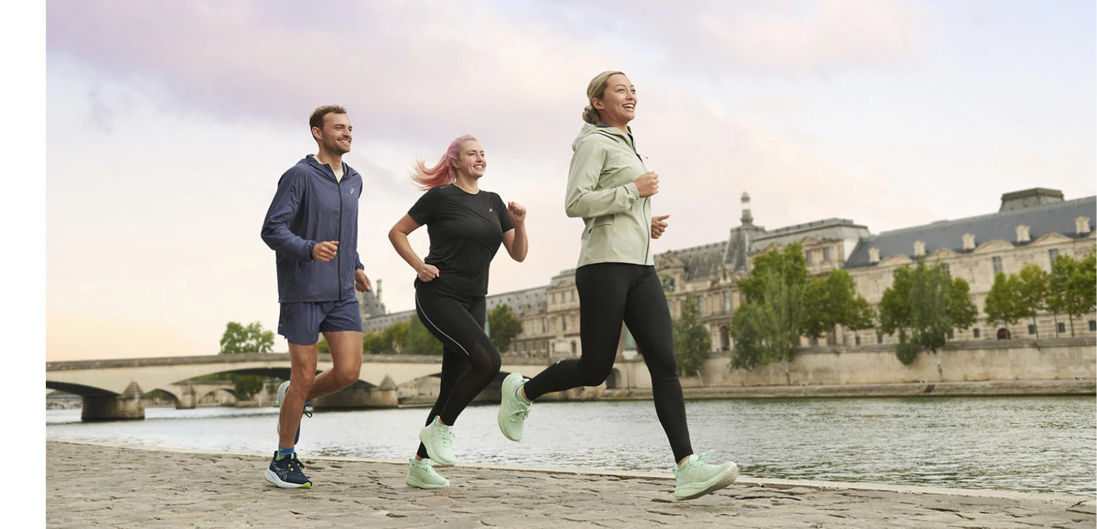 Group of men and woman running together in cooler weather