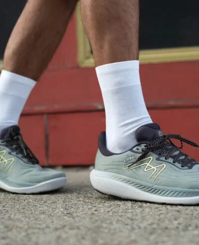 Man wearing Karhu Ikoni 3.0 with tall socks
