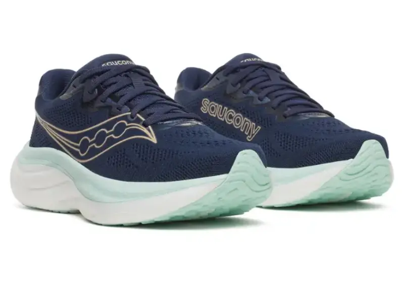 Women&rsquo;s Saucony Ride 19 running shoes in navy and aqua shown in side angle view with PWRRUN+ midsole.